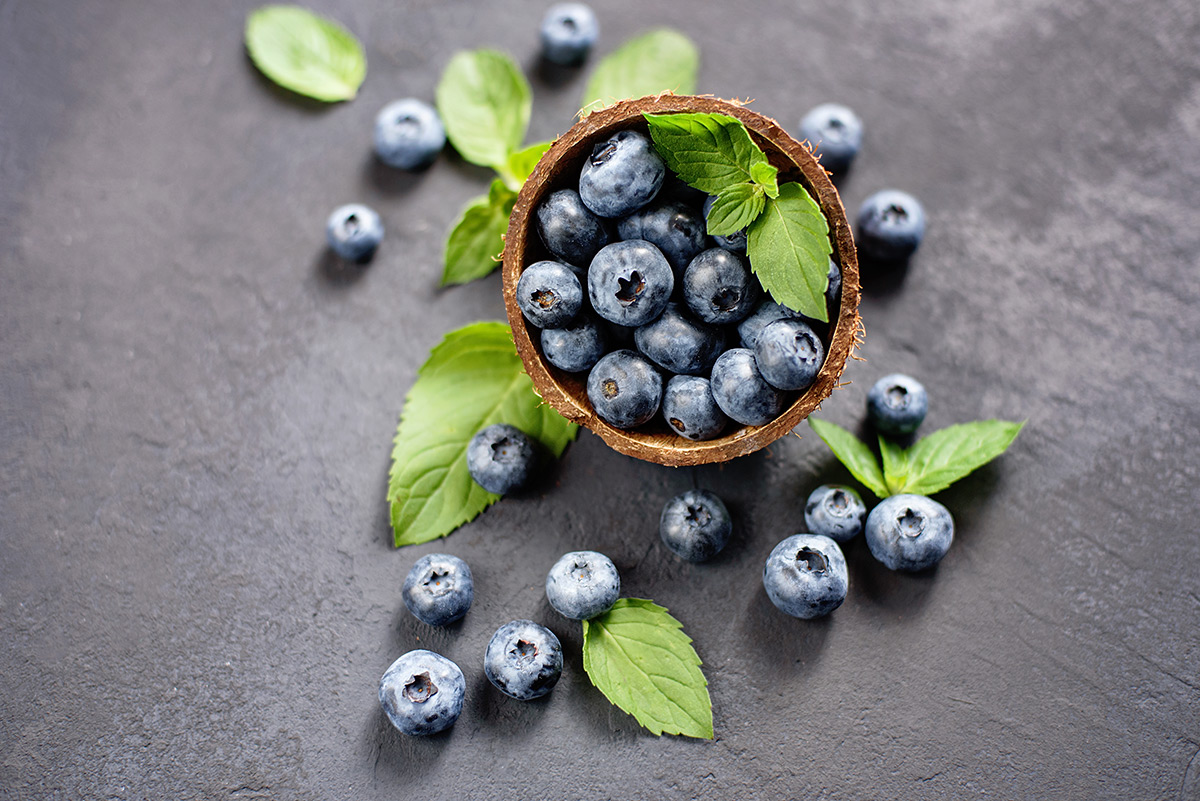 fresh-blueberries-and-mint-in-wooden-bowl fresh-blueberries-and-mint-in-wooden-bowl