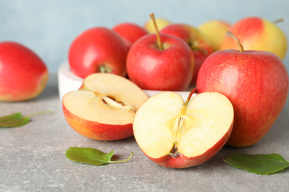 red-apples-on-grey-background